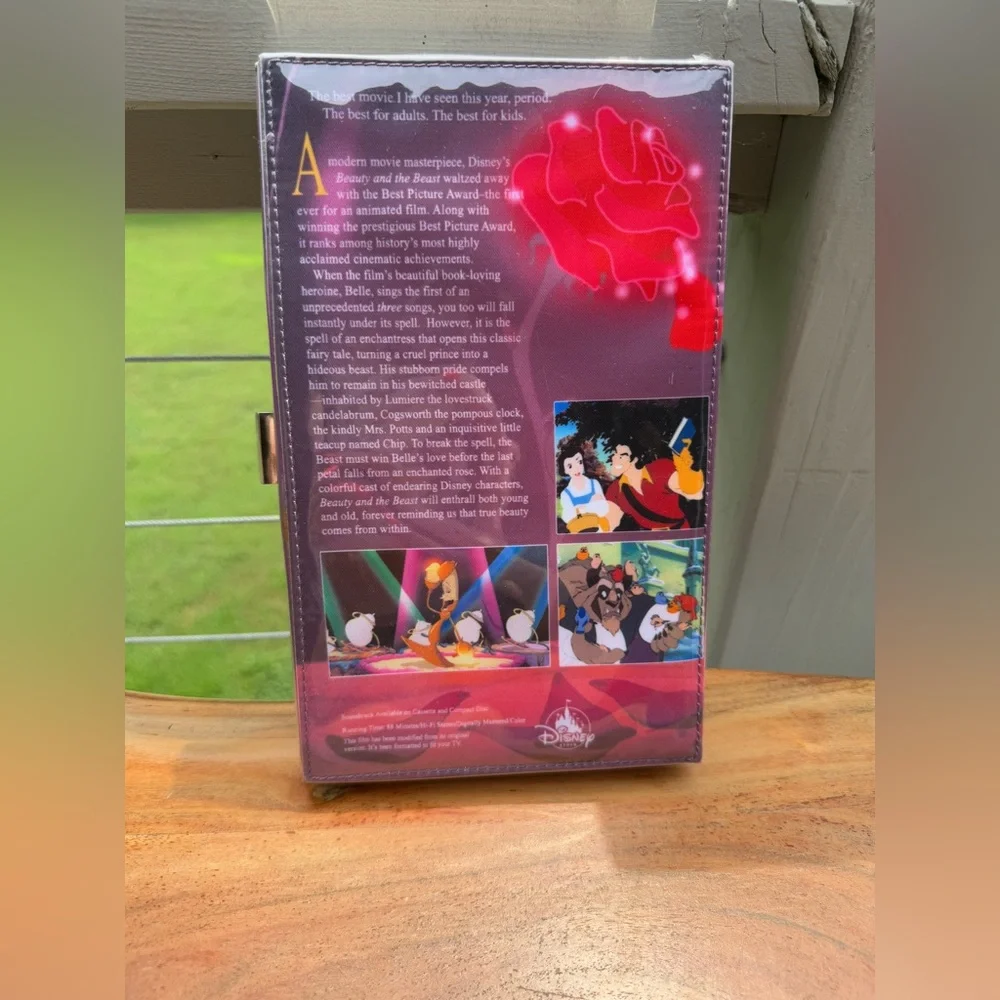 Oh My Disney Beauty and the Beast VHS clutch.